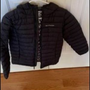 Columbia jacket in the color black. The size is equivalent to a 10/12 in big kid